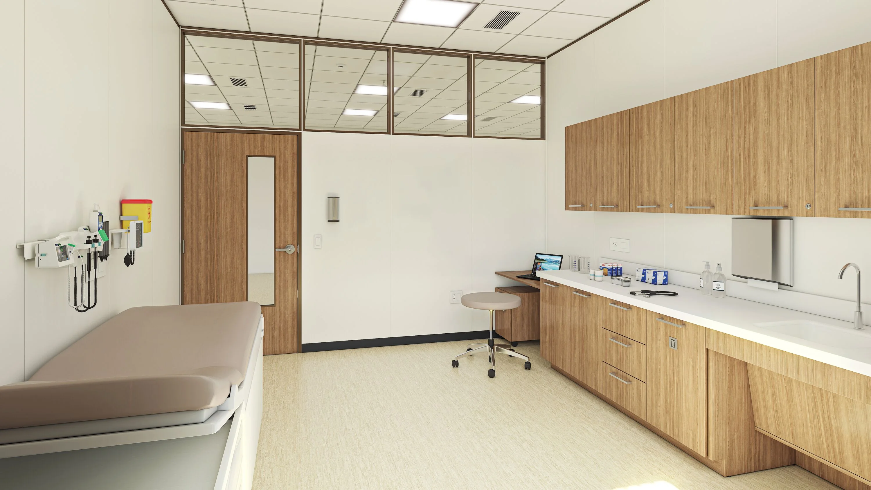 Healthcare exam room with modular casework and clinical work surfaces.